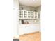 Built-in white cabinets and countertop, great for storage and serving at 17 Hampton Way, Carrollton, GA 30116
