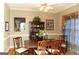 Traditional dining room with hardwood floors and detailed trim, ideal for Gathering meals at 17 Hampton Way, Carrollton, GA 30116