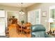 Charming dining room with wood floors and views into the living room at 17 Hampton Way, Carrollton, GA 30116