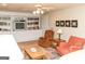 Comfortable living area featuring built in bookcases and neutral paint at 17 Hampton Way, Carrollton, GA 30116