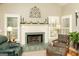 Cozy living room featuring a fireplace and comfortable seating, perfect for relaxation and gatherings at 17 Hampton Way, Carrollton, GA 30116