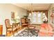 Elegant living room featuring hardwood floors, sophisticated furnishings, and a grand chandelier at 17 Hampton Way, Carrollton, GA 30116