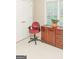 Bright office space with large window, light walls, carpeted floor, and extra cabinet space for storage at 17 Hampton Way, Carrollton, GA 30116