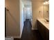 Bathroom with wooden floors, cabinets and a single sink at 1151 Park Center Nw Cir, Austell, GA 30168