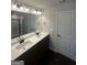 Bathroom with double sinks and a large mirror at 1151 Park Center Nw Cir, Austell, GA 30168