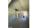 Large bedroom with carpet and a tray ceiling with a fan at 1151 Park Center Nw Cir, Austell, GA 30168