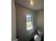 A powder room is a small bathroom with a toilet and sink, perfect for guests at 1151 Park Center Nw Cir, Austell, GA 30168