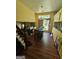 Spacious dining room with large window and access to kitchen at 6296 Marbut Farms Trl, Lithonia, GA 30058