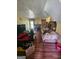 Comfortable living room featuring a fireplace, and a bright, open floor plan at 6296 Marbut Farms Trl, Lithonia, GA 30058