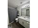 Well-lit bathroom with neutral walls and modern fixtures at 85 Creekside Trl, Covington, GA 30016