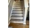 Carpeted stairs leading to the upper level of the house at 213 Bonnie Sue Dr, Villa Rica, GA 30180