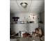 Storage room with drop ceiling, athletic decorations, and neutral walls at 213 Bonnie Sue Dr, Villa Rica, GA 30180