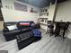 View of the basement featuring a seating area with sofa, bar table, and carpet at 4080 Longford Ne Dr, Marietta, GA 30066