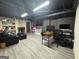 Finished basement with neutral paint, recessed lighting, and vinyl flooring at 4080 Longford Ne Dr, Marietta, GA 30066