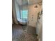 Bathroom featuring a clawfoot tub and a walk-in shower with modern fixtures at 4080 Longford Ne Dr, Marietta, GA 30066