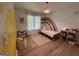 bedroom with hardwood floors, natural light, rainbow decor and decorative wall at 4080 Longford Ne Dr, Marietta, GA 30066