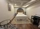 Cozy bedroom features natural light, wooden floor, and neutral decor at 4080 Longford Ne Dr, Marietta, GA 30066