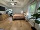 Spacious bedroom with hardwood floors and lots of natural light at 4080 Longford Ne Dr, Marietta, GA 30066
