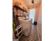 Laundry room with tile floor, washer and dryer, wood shelf and natural light at 4080 Longford Ne Dr, Marietta, GA 30066