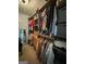 Organized walk-in closet with shelving and hanging space for clothing and accessories at 4080 Longford Ne Dr, Marietta, GA 30066