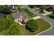 Breathtaking aerial view of the brick home showcasing the manicured lawn at 1120 Twin Bridge Ln, Peachtree City, GA 30269