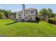 Spacious backyard features a large, well-maintained lawn and a stone patio at 1120 Twin Bridge Ln, Peachtree City, GA 30269