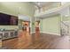 Spacious living room featuring hardwood floors and a view of the kitchen at 1120 Twin Bridge Ln, Peachtree City, GA 30269