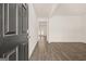 Inviting entryway with dark wood-style floors and white walls leading into the home at 620 Whitman Ln # 31, Stockbridge, GA 30281