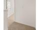 Upstairs hallway with carpet and neutral paint at 620 Whitman Ln # 31, Stockbridge, GA 30281