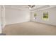Spacious main bedroom with large windows and neutral carpeting at 620 Whitman Ln # 31, Stockbridge, GA 30281