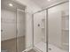Sleek walk-in shower with glass doors and built-in shelves at 620 Whitman Ln # 31, Stockbridge, GA 30281