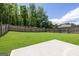 Backyard featuring a well-maintained yard at 150 Gadson Dr, Fayetteville, GA 30214