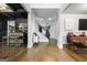 Inviting foyer featuring hardwood floors, elegant columns, a staircase, and stylish decor at 150 Gadson Dr, Fayetteville, GA 30214