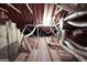 Unfinished attic space showing wooden beams, duct work and insulation at 3533 Saddlebrook Dr, Loganville, GA 30052