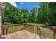 Large grassy backyard includes mature trees and view of a soccer goal at 3533 Saddlebrook Dr, Loganville, GA 30052