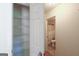 Bathroom features a toilet, shower with curtain, and storage closet at 3533 Saddlebrook Dr, Loganville, GA 30052