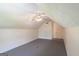 Bonus room features white ceiling fan, gray carpet and bright white walls at 3533 Saddlebrook Dr, Loganville, GA 30052