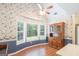 Eat-in kitchen area with ample natural light and wood floors at 3533 Saddlebrook Dr, Loganville, GA 30052