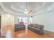Bright living room showing an open floor plan, hardwood floors, and inviting decor at 3533 Saddlebrook Dr, Loganville, GA 30052