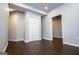 Finished basement featuring wood-look flooring and white trim at 137 River Birch Dr, Carrollton, GA 30116