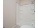 Clean bathroom featuring a shower, with built-in shelves, providing a functional space at 137 River Birch Dr, Carrollton, GA 30116