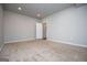 Cozy bedroom featuring neutral carpet and ample closet space, providing comfort and storage at 137 River Birch Dr, Carrollton, GA 30116