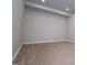 Bedroom with neutral carpet and base trim at 137 River Birch Dr, Carrollton, GA 30116