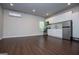 Open-concept living area featuring a modern kitchen at 137 River Birch Dr, Carrollton, GA 30116