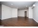 Spacious open-concept living area with modern flooring and neutral wall paint at 137 River Birch Dr, Carrollton, GA 30116