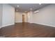 Bright living room with hardwood floors, recessed lights, and access to the backyard at 137 River Birch Dr, Carrollton, GA 30116