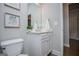 Bathroom featuring wood floors, a plant on the counter, and a white vanity at 137 River Birch Dr, Carrollton, GA 30116
