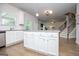 This open concept allows seamless transition between kitchen, living room, and dining room at 137 River Birch Dr, Carrollton, GA 30116