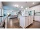 Open kitchen layout connects to the living and dining areas, promoting seamless entertaining at 137 River Birch Dr, Carrollton, GA 30116