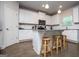 Bright kitchen features stainless steel appliances, granite countertops, and a convenient island at 137 River Birch Dr, Carrollton, GA 30116